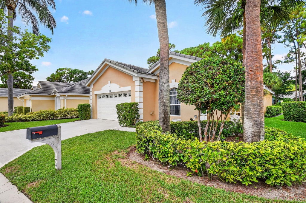 Photo of 174 HARBOR LAKE Circle, Greenacres, FL 33413 (MLS # B26087818)