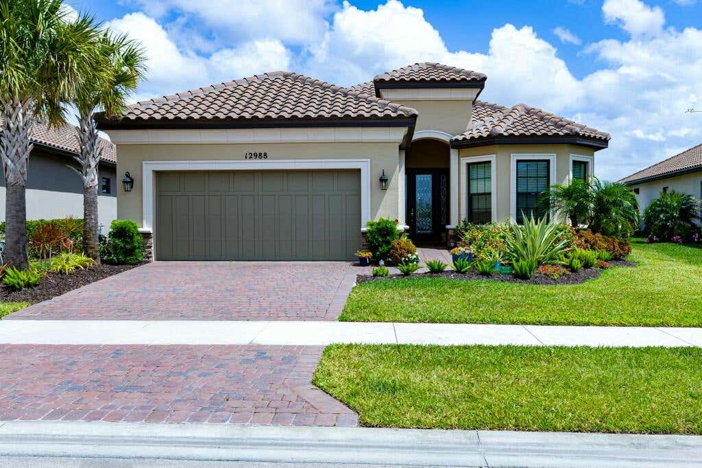 Photo of 12988 SW Ambra Street, Port Saint Lucie, FL 34987 (MLS # R11081679)