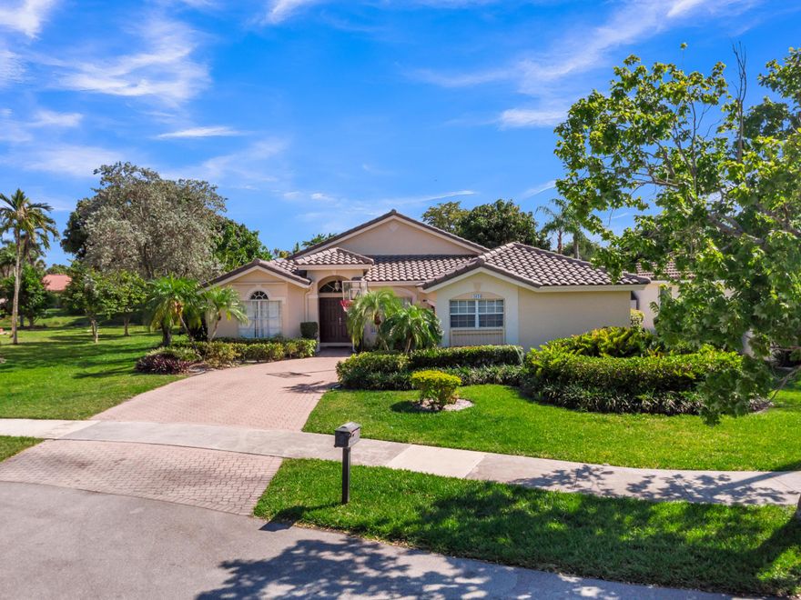 Welcome to this beautifully maintained 3-bedroom, 2-bathroom single-family residence with a 2-car garage, ideally situated on a quiet cul-de-sac in the heart of Coconut Creek. This inviting home offers tranquil water views from the screened-in patio, creating an ideal setting for both relaxation and entertaining. Interior features include both laminate and ceramic tile flooring and a thoughtfully updated kitchen appointed with stainless steel appliances. The generously sized backyard provides ample space for outdoor enjoyment. Conveniently located near parks, schools, and shopping, this exceptional Winston Park home offers a wonderful blend of comfort, style, and everyday convenience.
