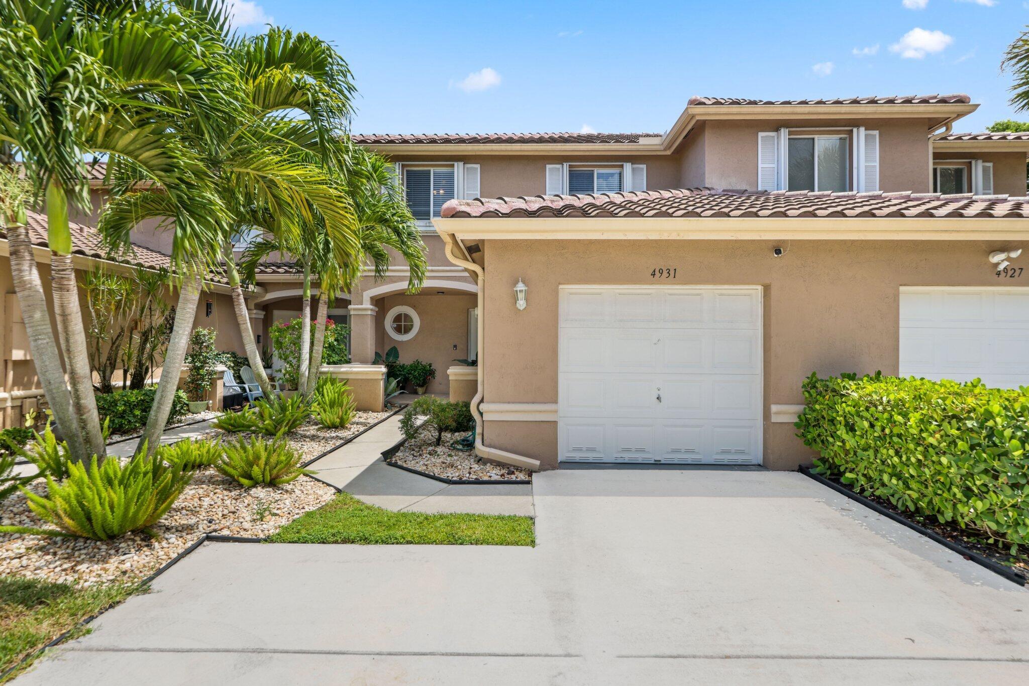 Welcome to 4931 Pinemore Lane in Lake Worth! This 3-bedroom, 2.5-bath townhouse features a 1-car garage, a 2023 roof, master bedroom with walk-in closet, and a kitchen with stainless steel appliances. Relax on the screened patio with storage while enjoying beautiful lake views. The gated community offers a pool, fitness center, and more. Great location close to shopping, dining, and major highways. Move-in ready and waiting for you!