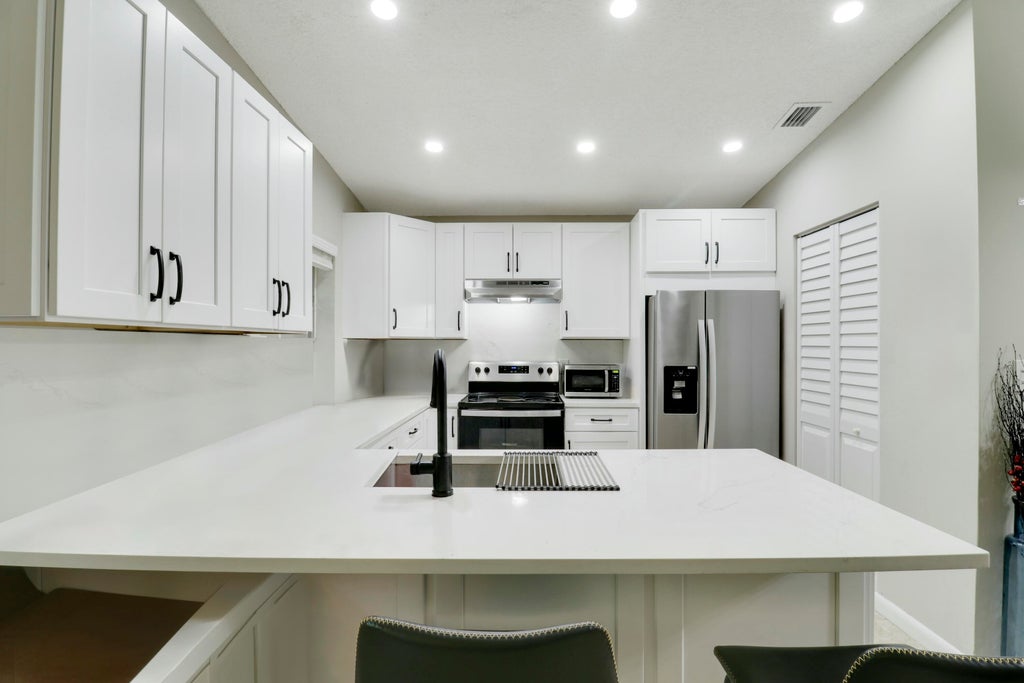 Photo of 22274 Misty Woods Way, Boca Raton, FL 33428 (MLS # R11072422)