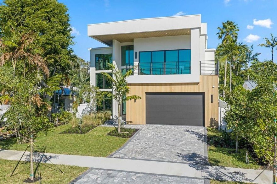 Elite does it again! This stunning 5-bedroom, 6-bath modern masterpiece features soaring ceilings throughout, a dramatic floating staircase, and a chef’s kitchen with a premium Thermador appliance package and hidden walk-in pantry. The spacious second-floor loft offers flexible living space, while the outdoor oasis boasts a built-in grill, spa, and pool—perfect for entertaining. Exceptional craftsmanship, sleek design, and luxurious finishes make this home truly one-of-a-kind.