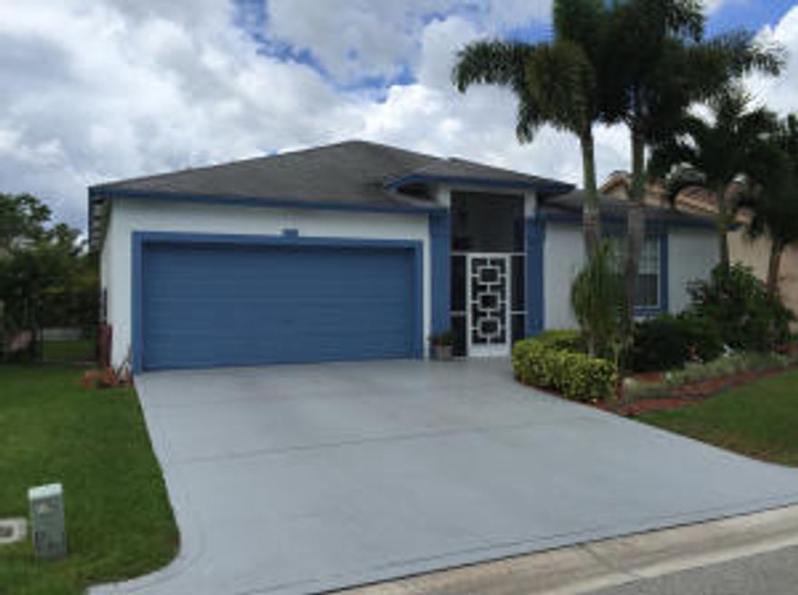 Super clean, cozy home ready to move into. Located on a quiet, tree lined street in the popular Normandy Isles community.