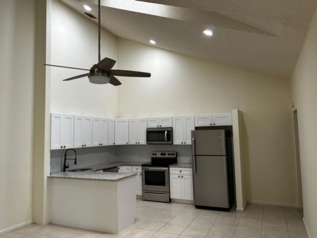 Photo of 1314 Periwinkle Place, Wellington, FL 33414 (MLS # R10997396)