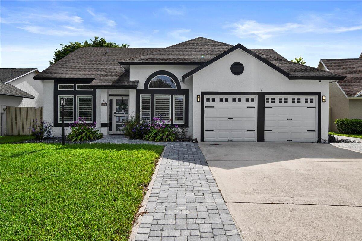 Stunning Renovated Seasonal Home in Meadowland Cove. This beautifully renovated, single-level home offers 3 spacious bedrooms and 2 fully updated bathrooms, designed with an open concept layout that boasts dramatic cathedral ceilings and skylights for an abundance of natural light. The heart of the home is the expansive, newly renovated kitchen featuring high-end stainless steel appliances and generous counter space, perfect for seasonal entertaining. The great room offers a seamless flow between the living and dining areas, making it ideal for both relaxation and hosting. Retreat to the luxurious primary suite complete with a completely renovated en-suite bathroom. The backyard is a private oasis, lushly landscaped for maximum privacy, and features a jacuzzi for ultimate relaxation. Enjo