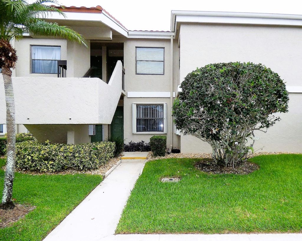 Photo of 13369 Touchstone Place #102, Palm Beach Gardens, FL 33418 (MLS # R10844423)