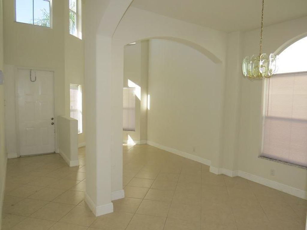 Photo of 5101 Prairie Dunes Village Circle, Lake Worth, FL 33463 (MLS # R11103701)