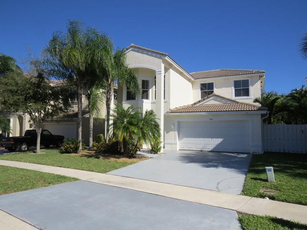 Photo of 5101 Prairie Dunes Village Circle, Lake Worth, FL 33463 (MLS # R11103701)