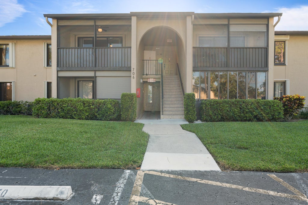 Photo of 706 Sunny Pine Way #E2, Greenacres, FL 33415 (MLS # B26045444)