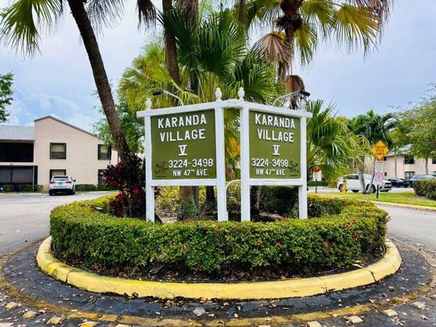 GREAT COMMUNITY OF ''KARANDA VILLAGE V'' IN THE DESIRED ''TOWNSHIP'' DEVELOPMENT OF COCONUT CREEK. A 3/2 SON THE 2ND FLOOR W/ STUNNING WATER VIEWS OF THE LAKE. CONDO HAS HAD MANY UPGRADES INCLUDING:  ROOF (2023), WATER HEATER (2024), WALK-IN SHOWER TILED TO CEILING, W/ COMMERCIAL GRADE GLASS & SWINGING DOOR & BARS FOR SAFETY (2023). BOTH BATHS REMODELED W/ CHERRY CABINETS & GRANITE COUNTERS. AC WAS MOVED FROM CEILING TO ENTRY CLOSET MAKING IT MUCH QUIETER & EASIER TO REPLACE FILTERS. ENCLOSED LANAI/FLORIDA ROOM HAS COMPLETE HURRICANE IMPACT WINDOWS EXPANDING THE LIVING AREA & LAKE VIEWS. THE LAUNDRY CLOSET HERE HAD WASHER & DRYER REPLACED. KITCHEN REMODEL INCLUDES RECESSED CEILING LIGHTS, POPCORN REMOVED & MATCHING WHITE APPLIANCES ADDED. SPLIT BEDROOM/BATH PLAN IS GREAT FOR GUESTS. (to pg