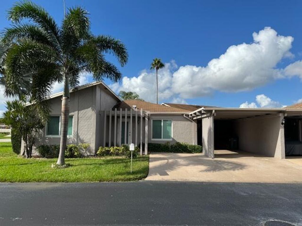 Photo of 14747 Wildflower Lane, Delray Beach, FL 33446 (MLS # B26012188)