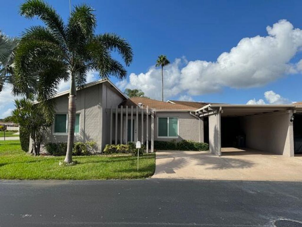 Photo of 14747 Wildflower Lane, Delray Beach, FL 33446 (MLS # B26012188)