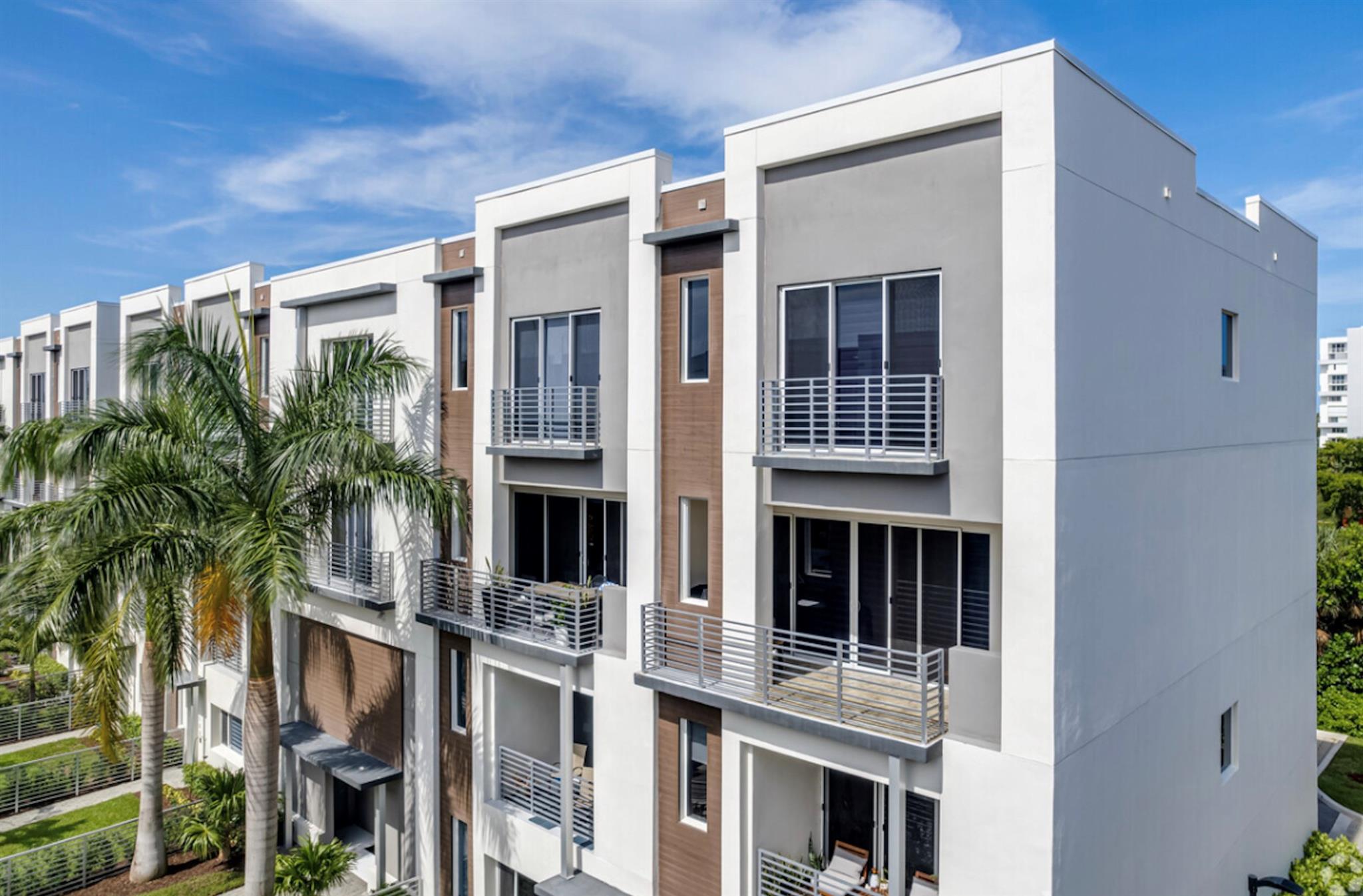 Modern 2BR/2BA townhome in gated Galleria Lofts. Open-concept living with impact windows, quartz kitchen, and private courtyard. Primary suite offers oversized shower, soaking tub, dual sinks, and east/west balconies. Upgrades include Nest thermostat, custom electric blinds, touch-sensor lock, and epoxy garage floor with cabinetry. Community pool, dog park, and prime location—walk to beach, Galleria Mall, dining, and minutes to Las Olas & airport.