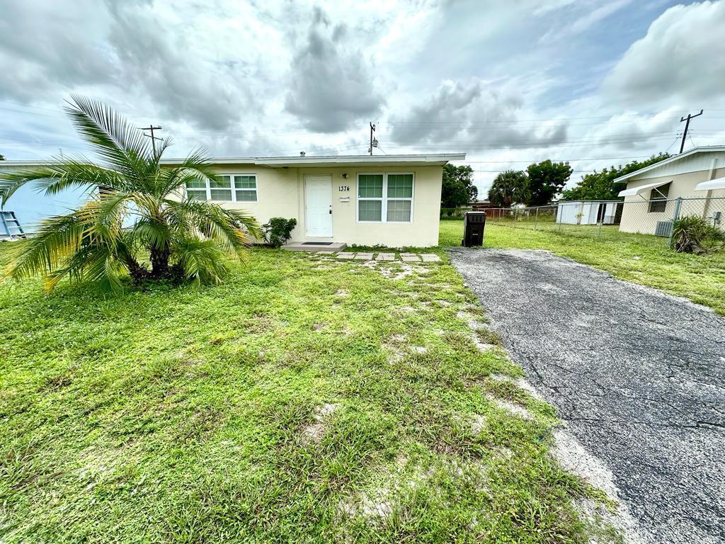 Charming 2 bedroom, 1 bathroom apartment located in sunny South Florida. This freshly painted unit features driveway parking for your convenience. The perfect place to call home. Don't miss out on this opportunity to live in a prime location without breaking the bank.