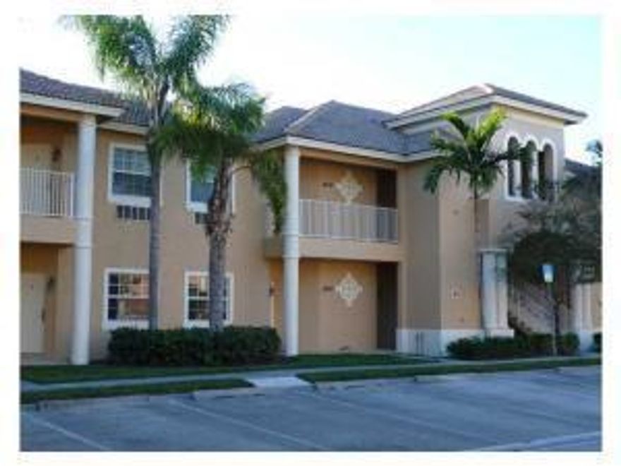 Come see this wonderful efficiency unit in Castle Pines at PGA Village. The unit has laminate flooring and newer furniture. This unit features CBS construction, barrel tile roof, ground floor unit on the lake & use of a storage closet w/ stackable washer & dryer. Efficiency set up, comes with, 1 full bath, 1 bed, dinette set, stainless mini refrigerator, stainless microwave and a sink. Castle Pines offers a resort style heated pool & spa. Tenant will have full use of the ''Island Club'', which offers a beautiful heated pool, tennis, basketball, playground, clubs, parties, gym, library and many events all year round.