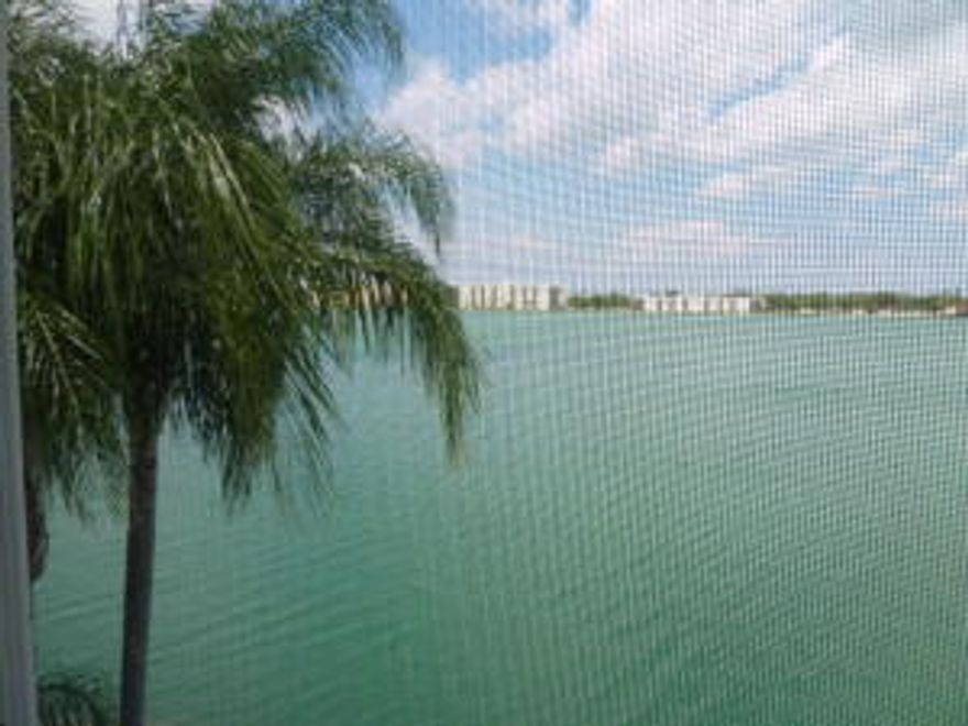 Enjoy fantastic lake views from this top floor unit in this resort style gated waterfront community! This unit has been recently painted throughout with designer ready flooring in kitchen, dining, living and bedrooms-just waiting for your renovations to turn it into the showplace that it can be. Lake Emerald boasts 24/7 security, 3 pools, clubhouse, fitness center, tennis, a jogging path around the lake, tiki huts with grills and gazebo. Do you like water sports? Swim, kayak, sail, windsurf or fish to your heart's content! The complex is close to major roads, shopping, airport and Ft. Lauderdale's fabled beach. Expanded cable included in your monthly condo fee. All ages are welcome, Fido is welcome too, pet weight restriction is 25lbs. A wonderful place to call home-come see for yourself!