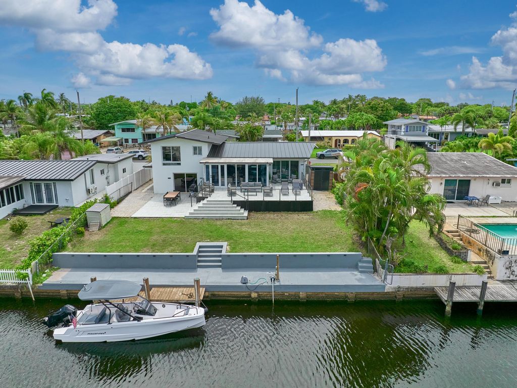 Photo of 2426 Key Largo Lane, Fort Lauderdale, FL 33312 (MLS # B26028948)