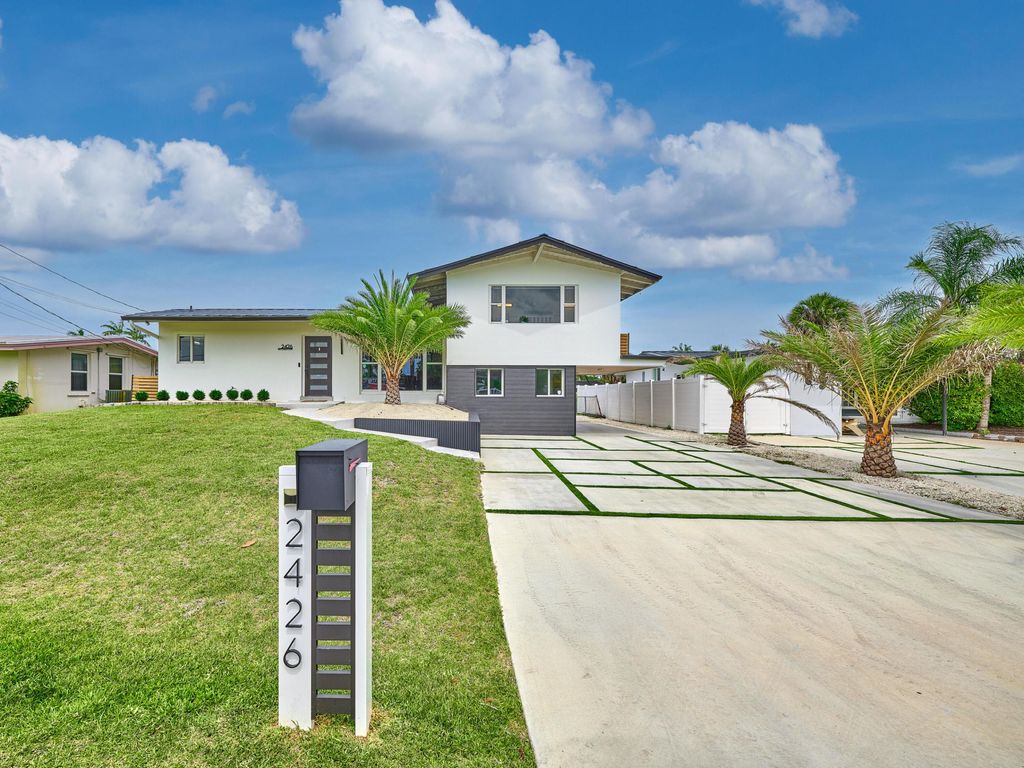 Photo of 2426 Key Largo Lane, Fort Lauderdale, FL 33312 (MLS # B26028948)