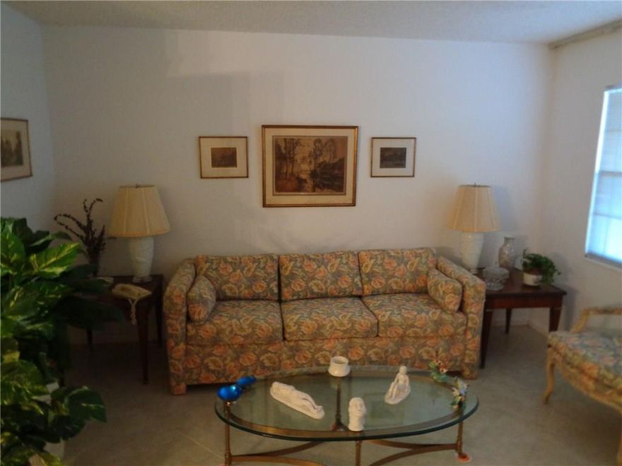 Super clean one bedroom with enclosed sunroom in prime building close to clubhouse.