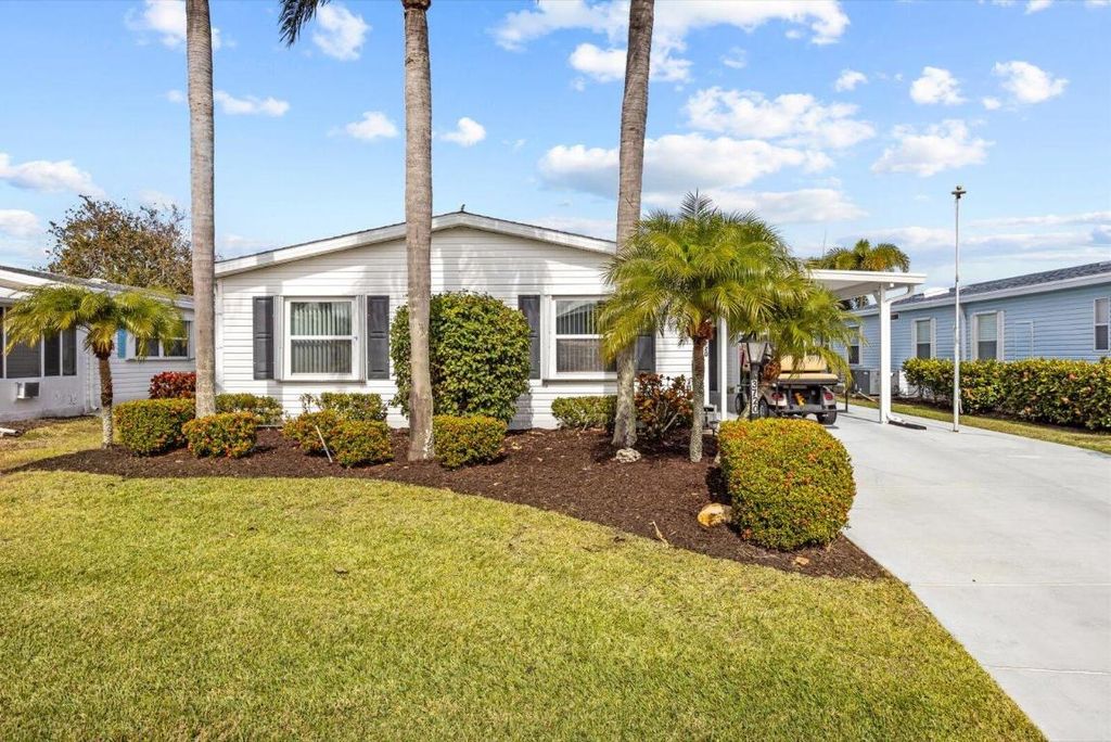 Photo of 3720 Pebble Beach Ln, Port Saint Lucie, FL 34952 (MLS # R11157538)