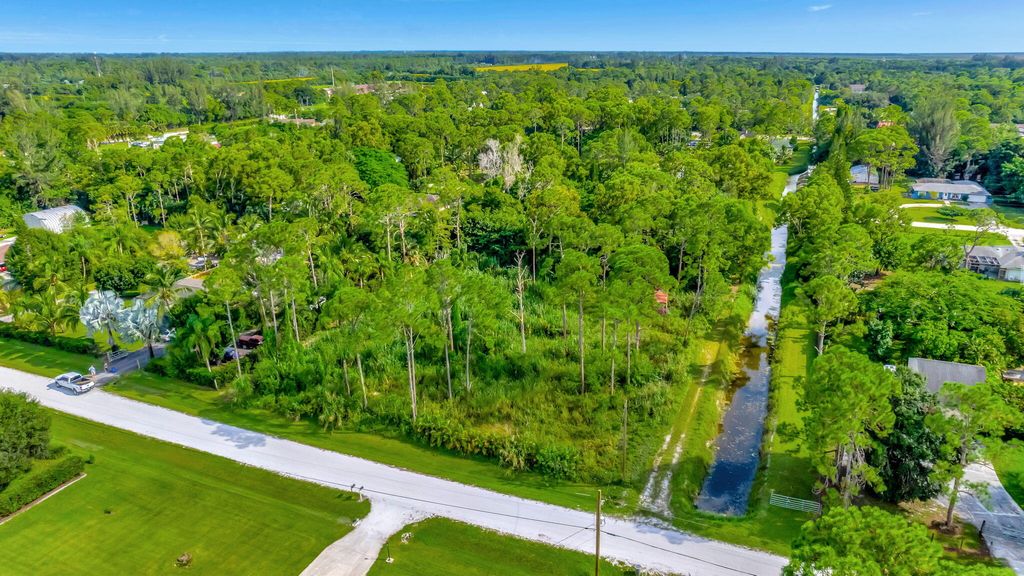 Photo of 16222 E Downers Drive, Loxahatchee, FL 33470 (MLS # R11017211)