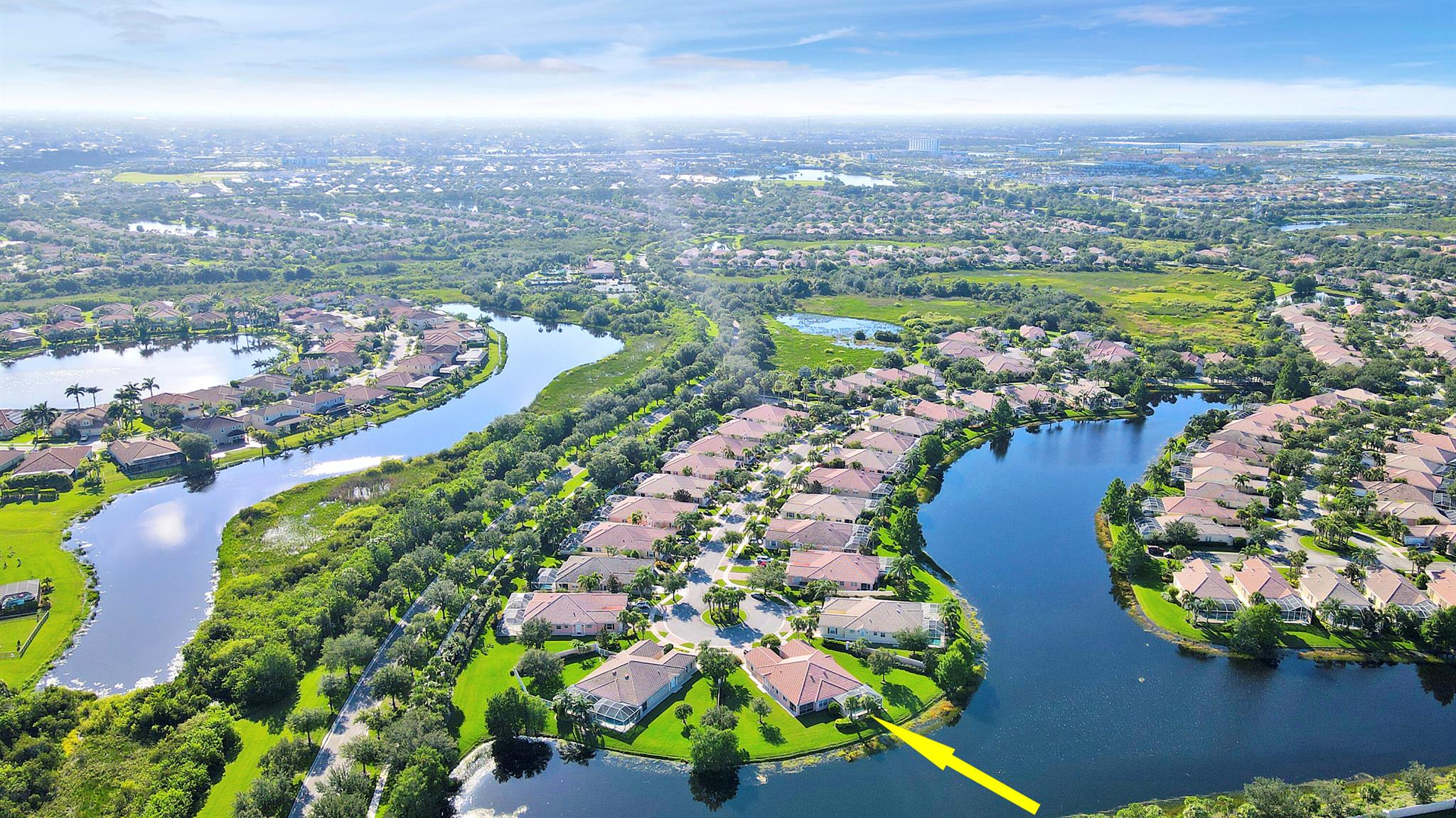 LOCATION, LOCATION, LOCATION! ENJOY BEAUTIFUL SUNSETS FROM THIS 2BR/2BA/2CG VILLA WITH PRIVATE POOL SITUATED ON AN INCREDIBLE, OVERSIZED, LAKEFRONT LOT! Nestled on a cul-de-sac with ultimate privacy, expansive lake views, a heated & screened pool and no rear neighbors. This lightly lived in home features an open floor plan, poured concrete construction, vaulted ceilings, tile flooring throughout the main living areas, carpeted bedrooms, plantation shutters, garage storage, a built in wall unit with display shelves in the living area, newer pool heater (2021), newer pool pump (2023), new water heater (2024) and a newer AC (2018). Both bedrooms can be closed off as suites and there is built in shelving in each closet. Whole house accordion shutters make storm preparation a breeze!