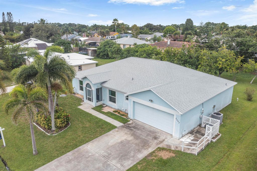 Photo of 2492 SE Burton Street, Port Saint Lucie, FL 34952 (MLS # R11121981)