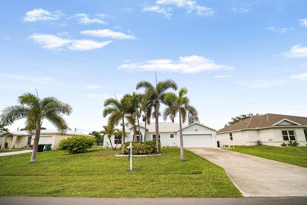 Photo of 2492 SE Burton Street, Port Saint Lucie, FL 34952 (MLS # R11121981)