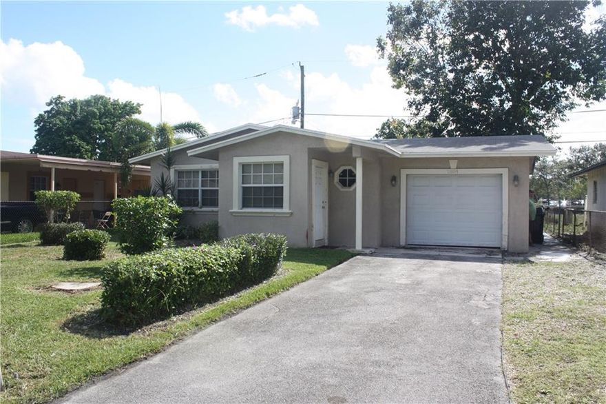 Don't miss this one! Great loaction for the commuter just blocks away from a major north/south artery. Approximately 4 miles to A1A and the beaches and the downtown/Las Olas area. Well maintained 3 Bedroom/2 Bath home  with a oversized 1 car garage and utility room for the washer/Dryer. Cental AC and Heat, PGT impact windows a newer kitchen, baths and roof had great value to this property. Easy to show and ready to go. Schedule your tour now!