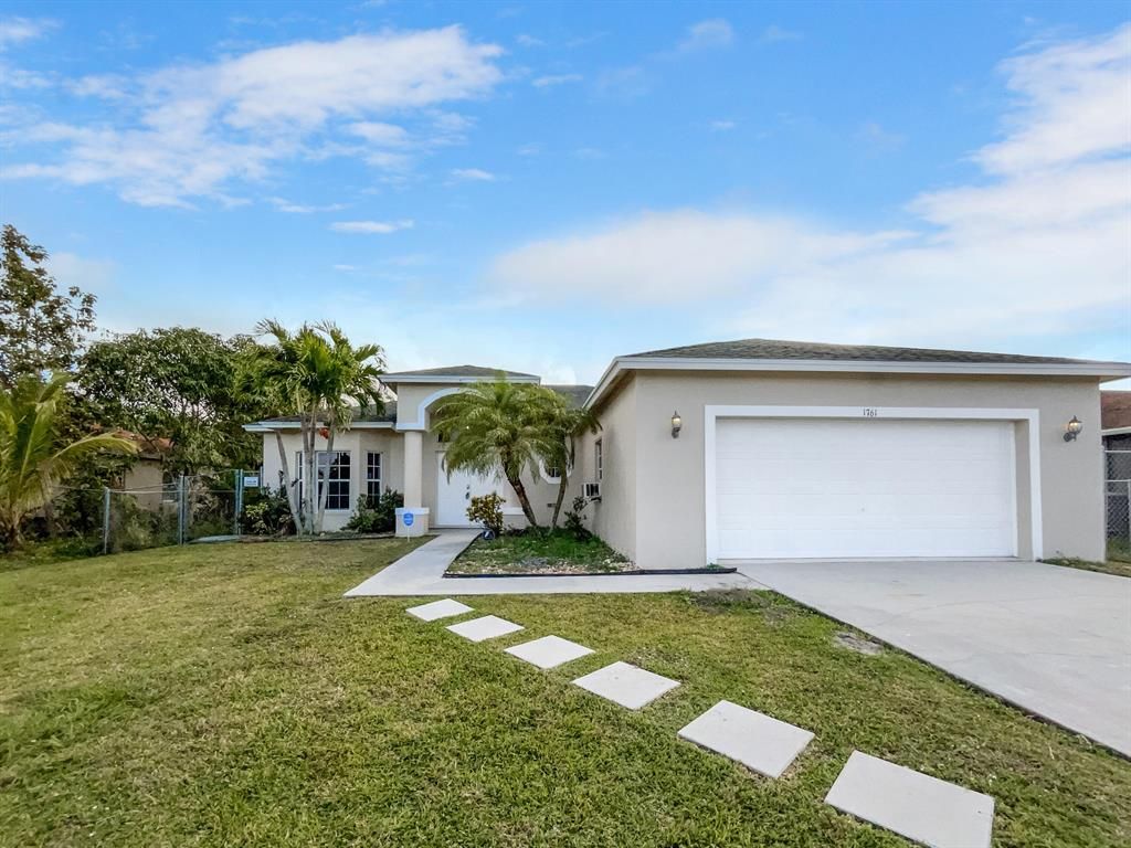 Photo of 1761 SW Glade Street, Port St Lucie, FL 34953 (MLS # R10826984)