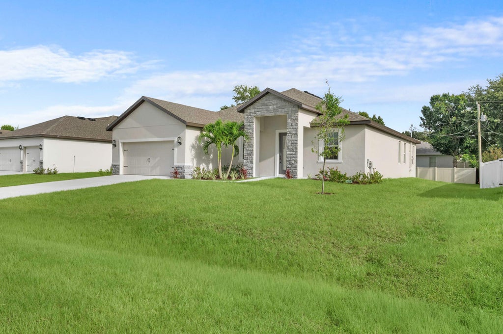 Photo of 1079 SW Placetas Avenue, Port Saint Lucie, FL 34953 (MLS # B26043285)