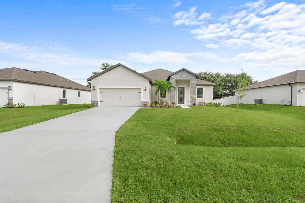 Photo of 1079 SW Placetas Avenue, Port Saint Lucie, FL 34953 (MLS # B26043285)