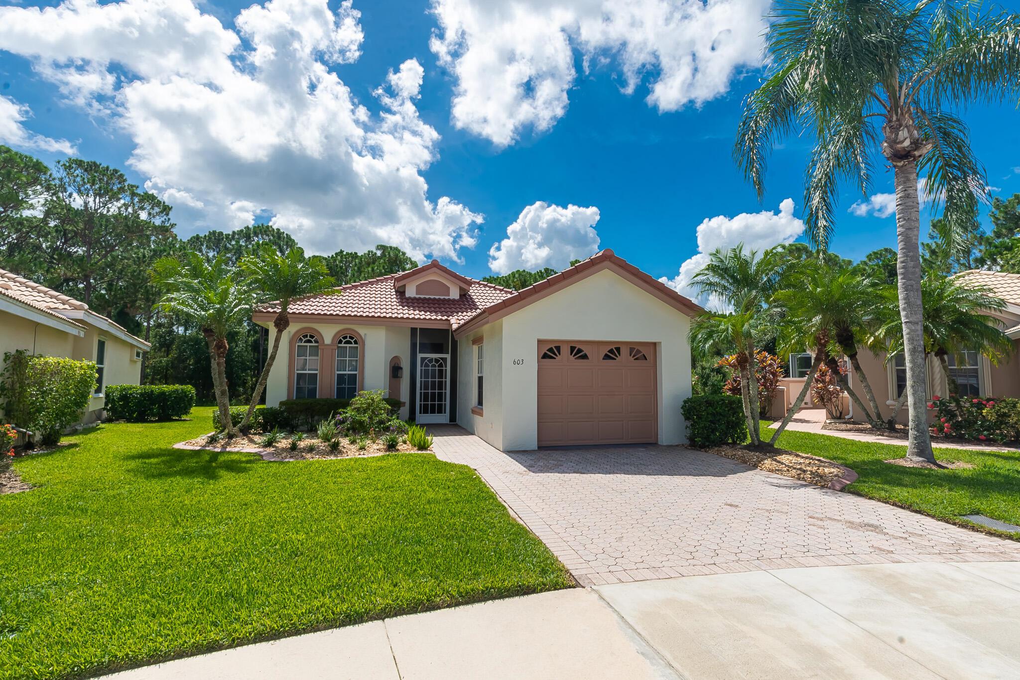 Discover this beautifully maintained 2 Bedroom , 2 bathroom, 1 car garage home with 2024 roof, A/C, and tankless water heater in the desirable Lake Charles community of St. Lucie West. Nestled on a quiet cul-de-sac, this home features granite kitchen counters, updated baths, plantation shutters, tile floors, extended driveway and fresh interior/exterior paint. Enjoy the extended screened lanai overlooking a serene preserve, plus enhanced landscaping with curbed flower beds. Community perks include preserves, lakes, pickleball, tennis, basketball, lawn care, and internet. Close to shopping, dining, Mets Stadium, and major highways--schedule your showing today!
