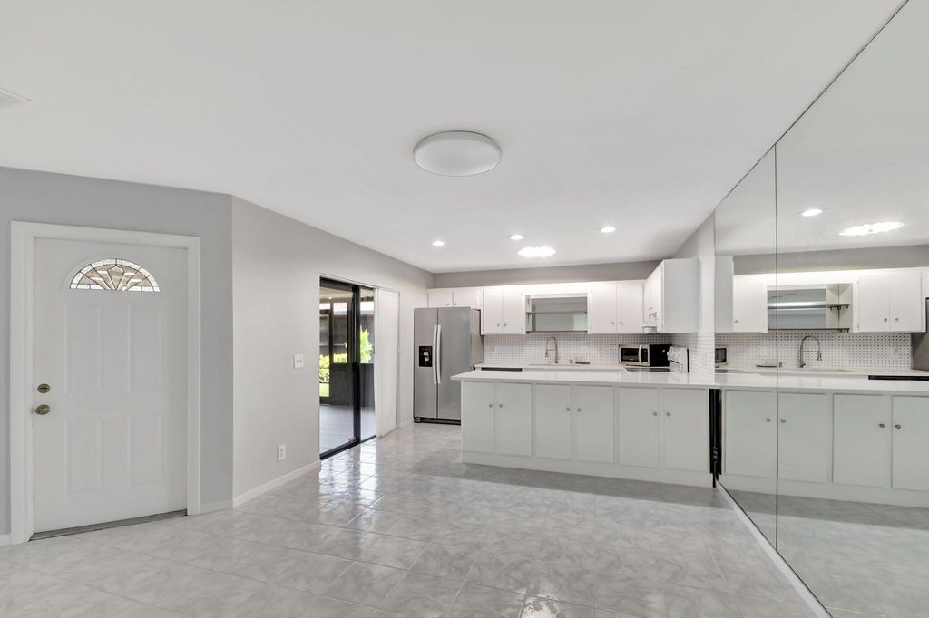 Photo of 4185 Turnberry Circle #903, Lake Worth, FL 33467 (MLS # R11103377)