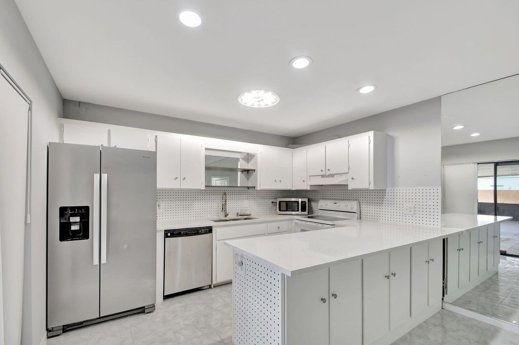 Photo of 4185 Turnberry Circle #903, Lake Worth, FL 33467 (MLS # R11103377)