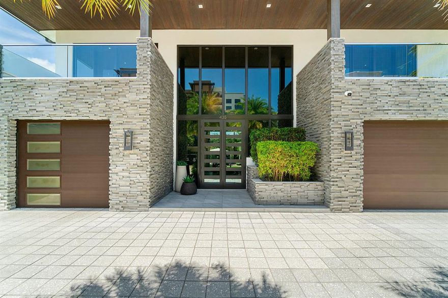 Nestled within an intimate neighborhood of Eastern Boca Raton, 435 East Boca Raton Road is a short walk from hotspots such as Mizner Park, Royal Palm Place, and the Atlantic Ocean. The architecture of this home blends contemporary design with a European flair. This home has been recently upgraded following its construction in 2017 to include features such as remote-controlled exterior lighting, turf with temperature control, surround-sound SONOS system inside and out, full-house gas generator, and air conditioning in all three garages.Designed for entertaining, this estate boasts both formal and informal living areas, custom wine refrigerator within a wine room, gourmet kitchen encompassing new Miele appliances, and convenient home office.