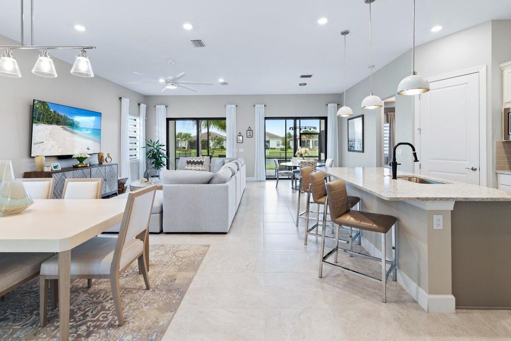 Photo of 579 SE Villandry Way, Port Saint Lucie, FL 34984 (MLS # R11139224)