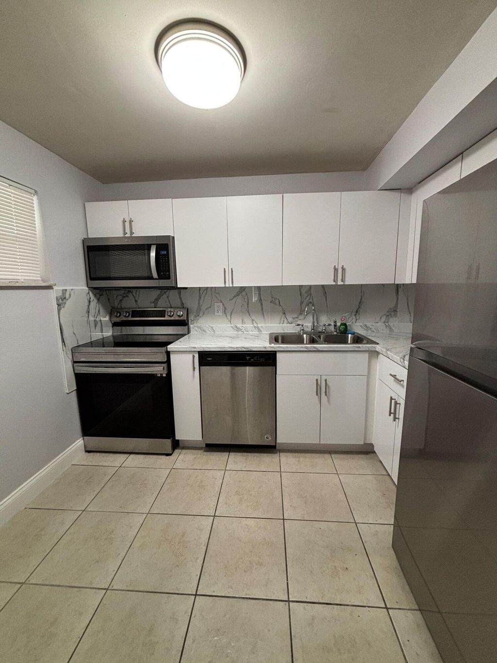Photo of 4255 N University Drive #101, Sunrise, FL 33351 (MLS # B26005453)