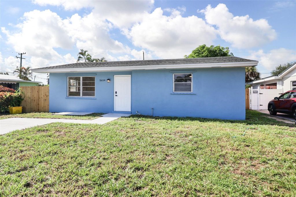 Photo of 5654 Papaya Road, West Palm Beach, FL 33413 (MLS # F10523232)