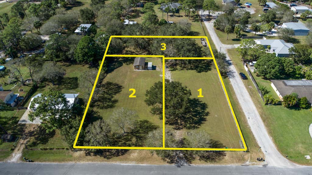 Photo of 355 GOKCHOFF RD, Fort Pierce, FL 34945 (MLS # B26065706)