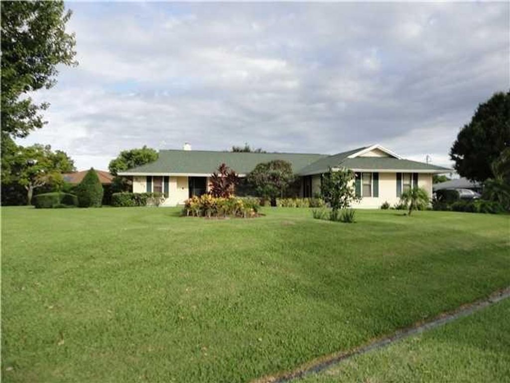 Photo of 2001 SE Hanford Road, Port Saint Lucie, FL 34952 (MLS # R10739476)