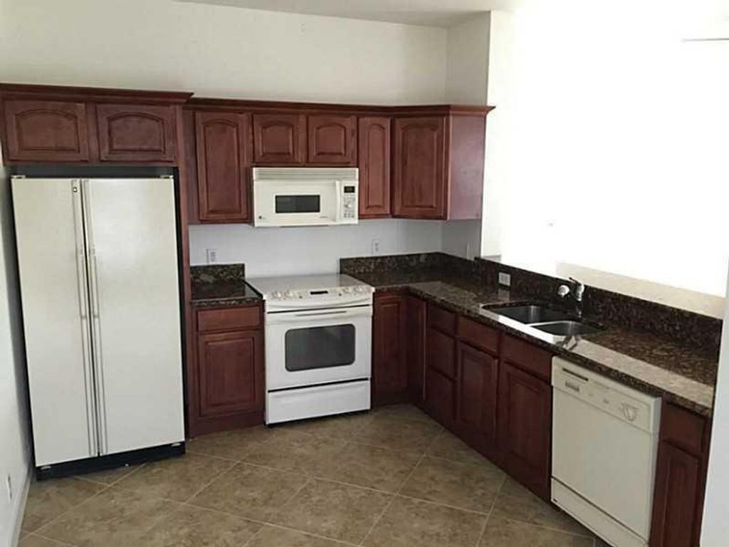 Photo of 1300 SW 44th Ter, Fort Lauderdale, FL 33317 (MLS # F10534114)