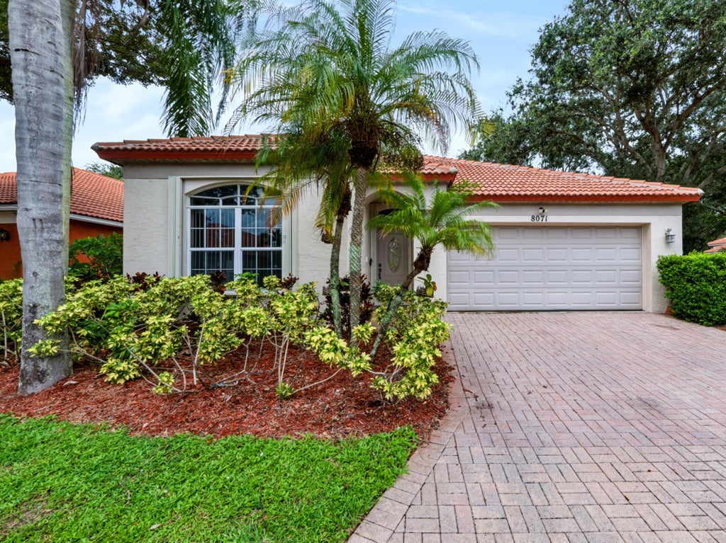 Photo of 8071 Via Hacienda, Riviera Beach, FL 33418 (MLS # B26093799)