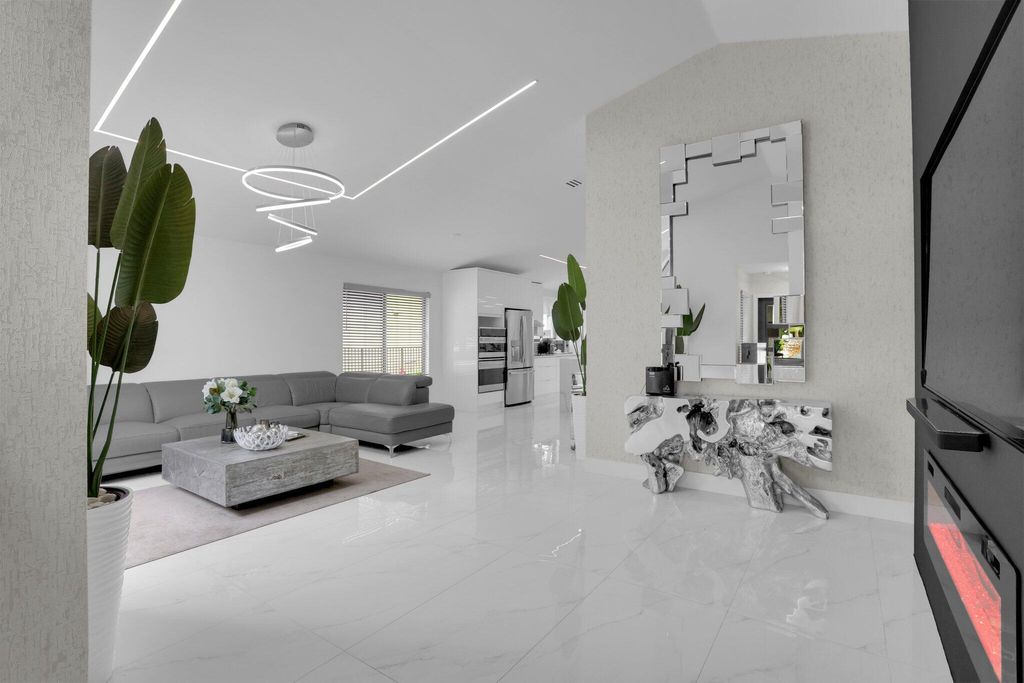 Photo of 469 NW 38th Avenue, Deerfield Beach, FL 33442 (MLS # R11165155)