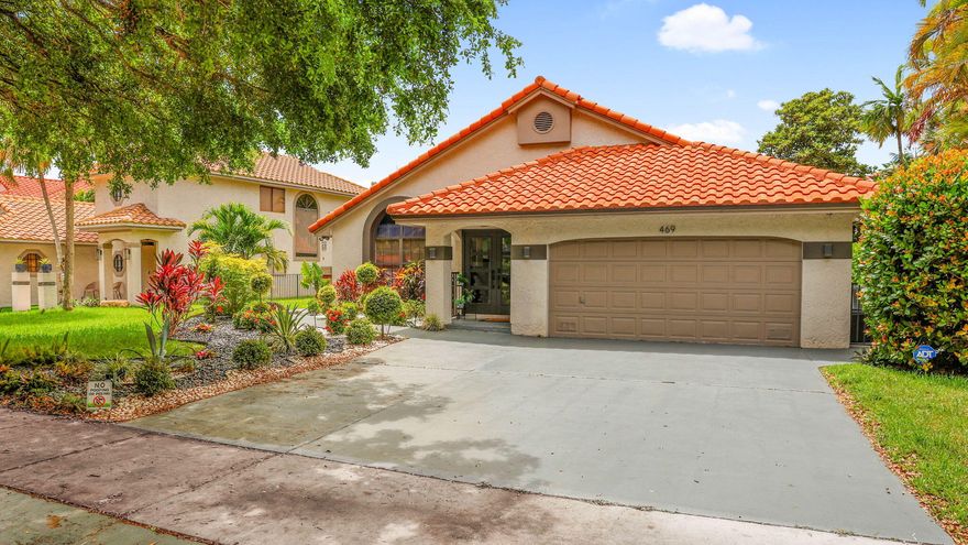 Welcome to a one-of-a-kind fully renovated home in East Deerfield Beach, just minutes from Boca Raton. Located on an oversized lot in a quiet, non-HOA neighborhood, this property offers style, space, and smart upgrades in every direction. The home features a clean, modern aesthetic with porcelain tile flooring throughout, an open layout, and bold architectural lighting that enhances every room. The kitchen includes quartz waterfall counters, high-gloss cabinetry, built-in double ovens, and a sleek cooktop setup. A massive island with seating anchors the space, perfect for daily living or entertaining.  The living area includes a built-in media wall with a mounted TV, linear electric fireplace, and custom wall accents. All bedrooms feature frosted glass doors, modern lighting, and smart u of space. The primary suite offers dual walk-in closets with glass shelving and full built-ins, and a designer bath with floating double vanity, LED mirrors, vessel sinks, and walk-in rainfall shower with matte gold fixtures.  The garage has been professionally converted into a self-contained studio suite with its own entrance, full bathroom, kitchenette, and AC. It's ideal for guests, multigenerational living, or potential rental income.  Out back, a fully enclosed air-conditioned gym is already set up with rubber flooring, mirrors, and commercial-grade equipment. The oversized lot still has room for a pool or expansion.  Major upgrades include a 2018 roof, impact glass front door and windows, and solar panels, offering energy efficiency and long-term value.  This location puts you just minutes from Boca Raton's beaches, restaurants, parks, and retail. Easy access to I-95, the Turnpike, and top-rated schools.  If you're looking for a fully upgraded home with design, functionality, and flexibility built in, this one has it all.