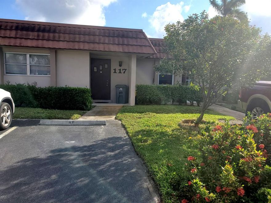 Species one bedroom villa with a large Florida room/ patio. Wood looking porcelain tile all trough. New vanity with new plumbing/ facet and new shower doors in the bathroom. Hardwood kitchen cabinets with new stove. Large storage/ laundry room. 2 assigned parking right up front at the entrance. 55+ community with large pool, shuffle courts and tennis courts. Big clubhouse for events and gatherings. Basic cable and water included.  Association have reserves/ no special assessments