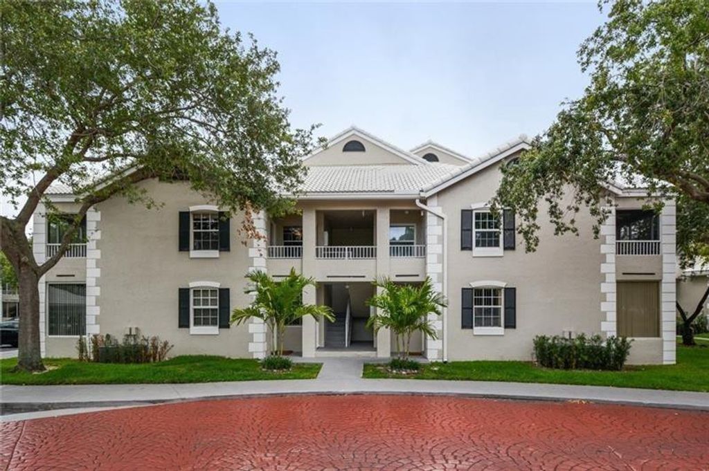 Photo of 2850 N Oakland Forest Drive #215, Oakland Park, FL 33309 (MLS # B26041459)