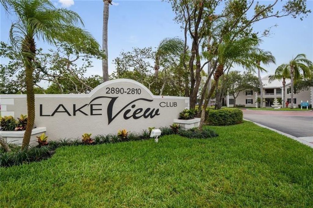 Photo of 2850 N Oakland Forest Drive #215, Oakland Park, FL 33309 (MLS # B26041459)