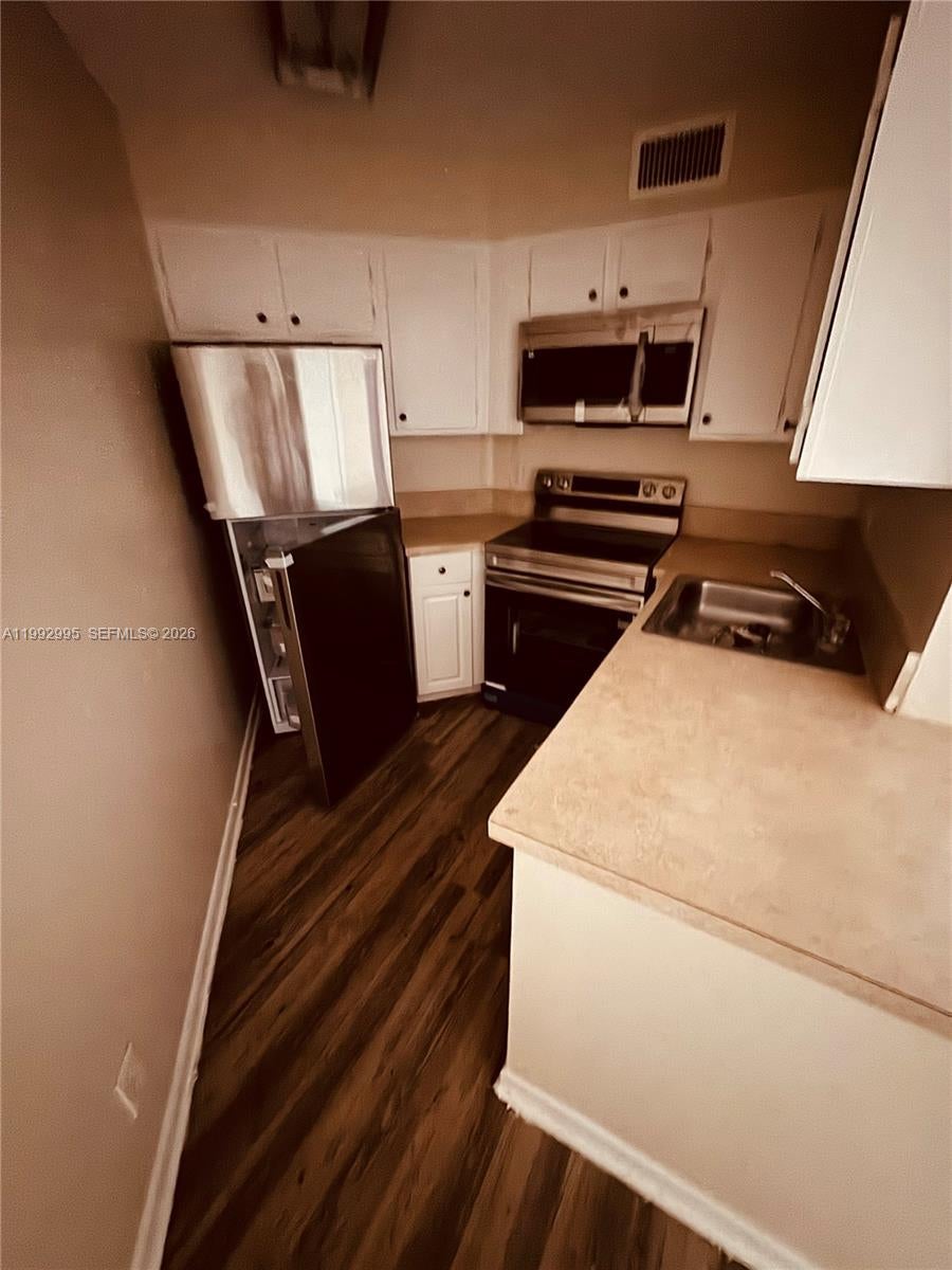 Photo of 211 Lake Pointe Drive #110, Oakland Park, FL 33309 (MLS # A11992995)