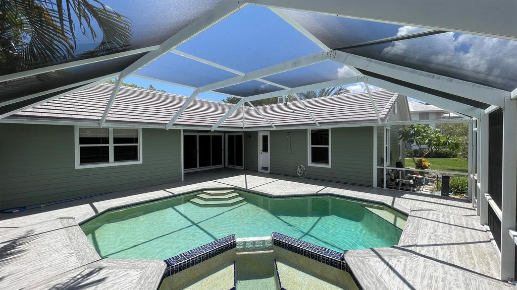 Photo of 18620 SE River Ridge Road, Jupiter, FL 33469 (MLS # R10896984)